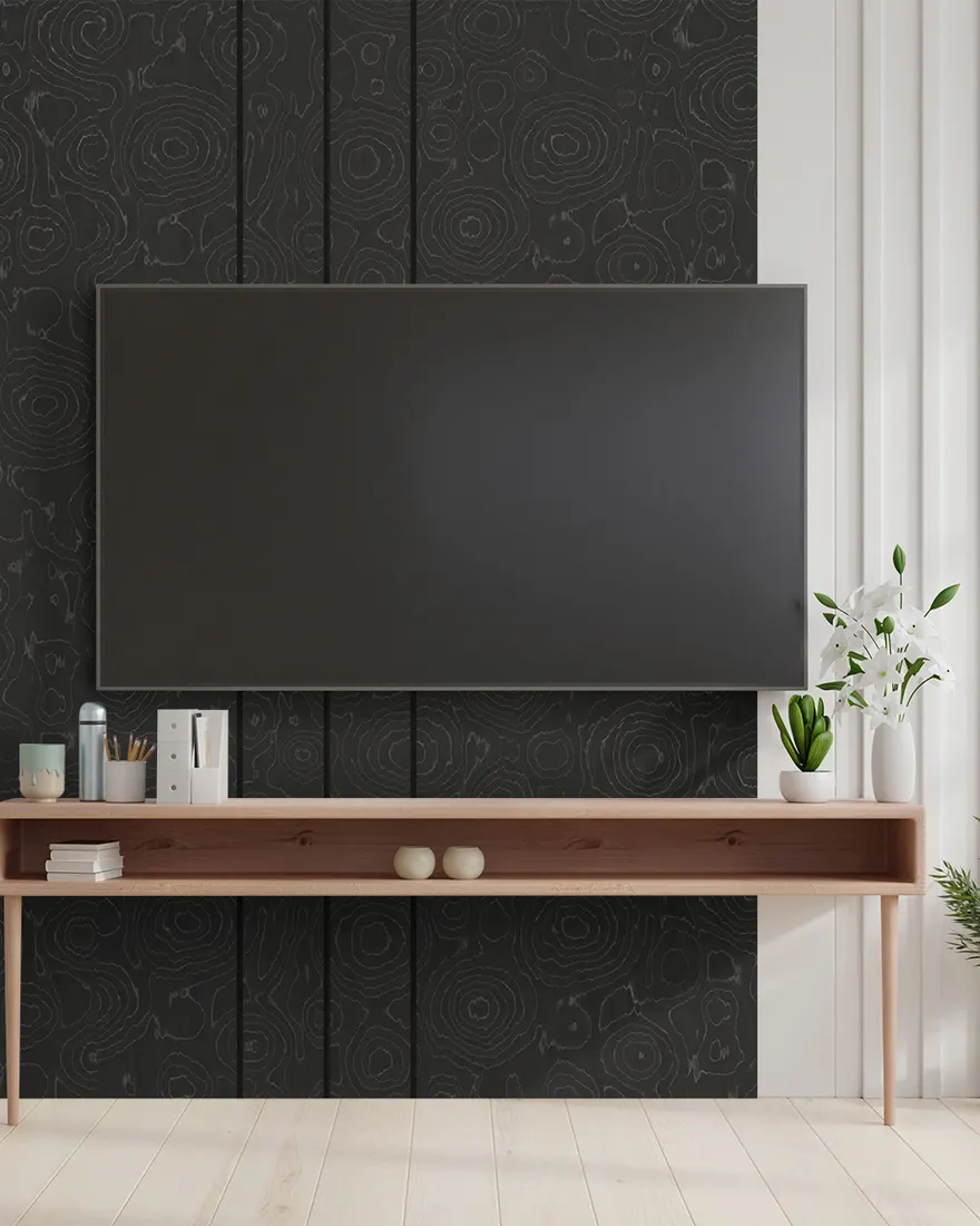 Television wall in charcoal laminate with a walnut console below